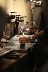 Closeup of Iced Caramel Macchiato at the coffee shop, Caramel Macchiato is a classic macchiato beverage. It consists of vanilla syrup, espresso, steamed milk, foam, and caramel drizzle