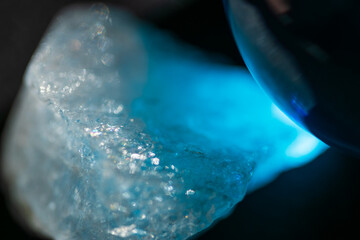 quartz crystal in shining blue light