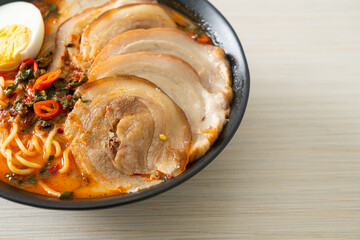 Ramen Noodles Spicy Tomyum Soup with Roast Pork