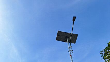 Solar street lamp with blue sky background.