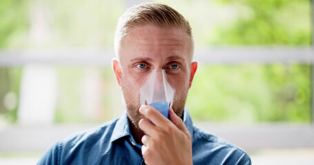 Asthma Patient Breathing Using Oxygen Mask