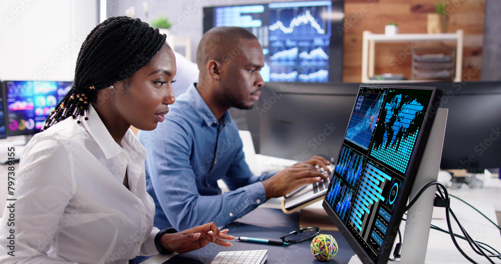 Poster african financial data analysts using dashboard on screens
