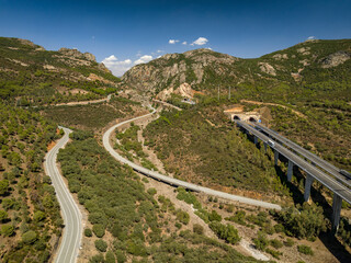 Aerial view of the Despeñaperros gorge and the roads that cross the strait (Jaén, Andalusia,...