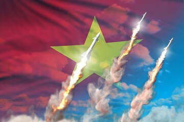 Vietnam ballistic warhead launch - modern strategic nuclear rocket weapons concept on blue sky background, military industrial 3D illustration with flag