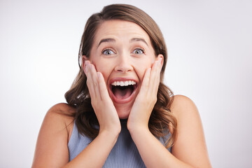 Woman, excited and portrait with expression in studio for reaction or secret or announcement. Young...
