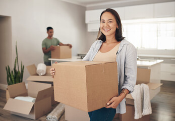 Happy, woman and moving box in new house for property, investment and real estate in living room. Female person, smile and pride in apartment for immigration, travel and relocate to Los Angels