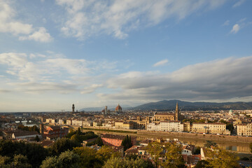 Fototapeta na wymiar Iconic Florence skyline at sunset over Arno River