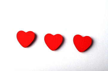 photo of red heart on white background, symbol of love