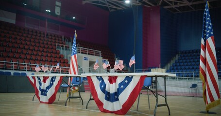 Elections in the United States of America. Table for voting registration with American flags stands at polling station. Presidential race and election coverage. Civic duty, patriotism and democracy. - obrazy, fototapety, plakaty