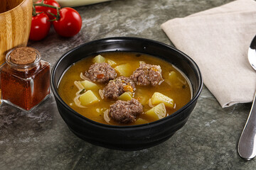 Soup with beef meatball and vegetables