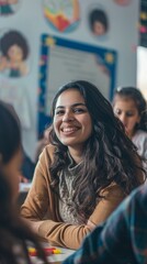Obraz premium Happy female teacher with students in Classroom 