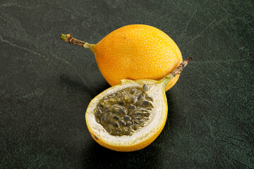 Yellow granadilla with cut half