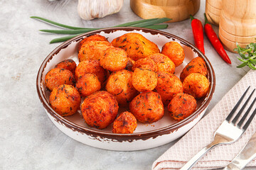 Baked young potato with paprika