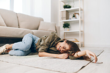 Comfortable Sofa in Cozy Apartment: A Happy Woman Relaxing at Home
