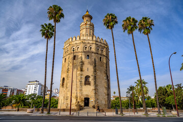 Fototapeta premium The Torre del Oro tower, an emblematic monument next to the Guadalquivir river (Seville, Andalusia, Spain)