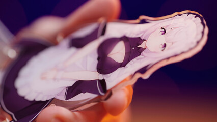 Holding cute anime maid girl figure in hands close-up details