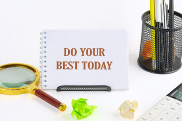Business motivational. Do your best today symbol on a notepad standing on a stand