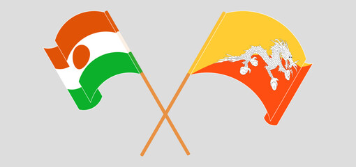 Crossed and waving flags of Niger and Bhutan