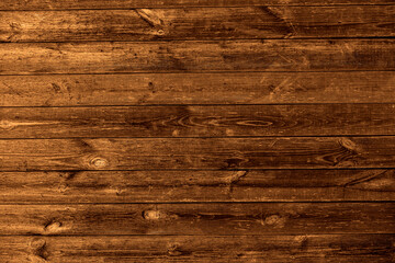 Top view of a vintage brown table surface with a wooden texture background, providing space for text, featuring old natural patterns. yellow table of narrow boards as background. Texture of old wood