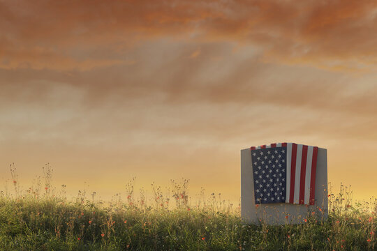 American flag laying on gravestone at peaceful flower meadow to remember the memorial day. 3D Rendering