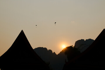 Golden light on the peaks: sunset in Vang Vieng