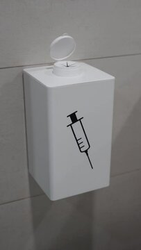 disposal of syringes container for syringes vertical video
