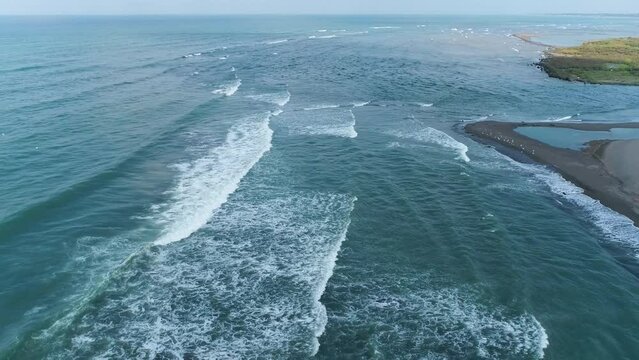 waves crashing on the beach