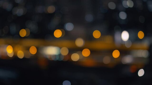 Blurred of night city skyscraper and car lights traffic bokeh , Soft Focus , Metropolis Backgound wallpaper for movie or documentary romantic mood concept	

