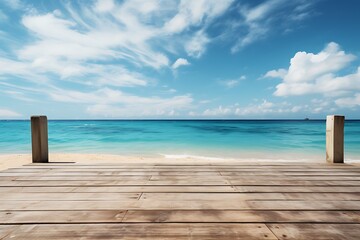 Wooden pier on tropical beach with turquoise water and blue sky