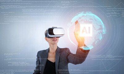 Businesswoman using AI generated while looking at holographic icon. Skilled project manager pointing at coding engineering prompt and programing system while standing at gray background. Contraption.