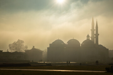 The silhouette of  Ulu Mosque (Camii) in Edirne and clouds  at the sunset