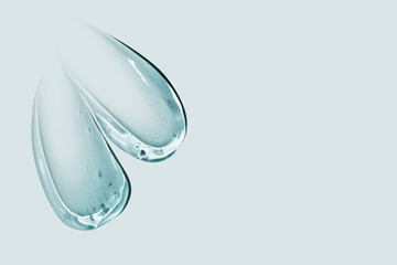 composition of smears of cosmetic blue gel on a blue background