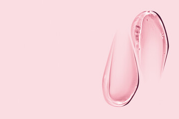 composition of smears of cosmetic pink gel on a pink background