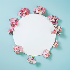 White, empty frame surrounded by flowers

