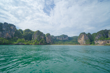 Obraz premium Clear blue turquoise seawater, Andaman sea in Phuket island in summer season, Thailand. Water in ocean pattern wallpaper background.