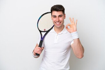 young tennis player man isolated on white background showing ok sign with fingers - Powered by Adobe