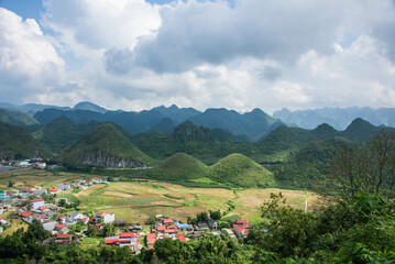 View of the Twin Mountains and limestone karst plateau from Quan Ba Heaven Gate, Tam Son, Ha Giang, Vietnam - obrazy, fototapety, plakaty