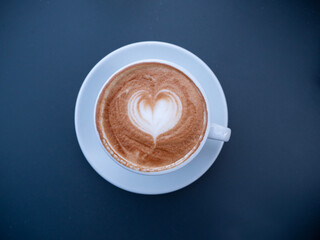 Italian cappuccino seen from above with a heart drawn on the foam