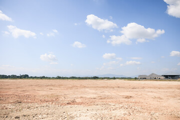 Land, blue sky and clouds. Include landscape, empty or vacant area at outdoor. Real estate or property for sale, rent, but, development, housing subdivision and construction in Chiang Mai of Thailand.