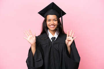Young university Colombian woman graduate isolated on pink background counting nine with fingers