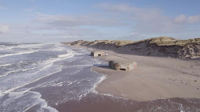 Crashing Sea Waves At The German Second World War Bunker Of Atlantic Wall. Aerial Shot