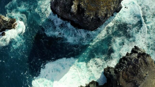 Ocean water churns in El Boiler San Benedicto Revillagigedo Islands Mexico, aerial top down