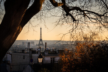 Landscape image showing the Eiffel tower view over the city of Paris at sunset