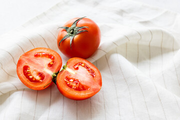 Tomatoes on a white cloth