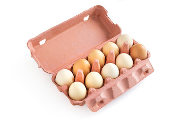 : Brown, white eggs in carton