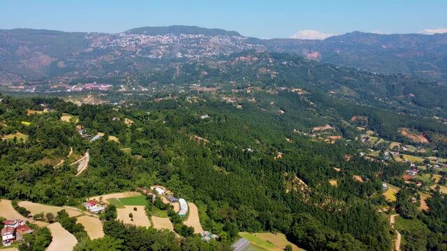 Aerial view of the rural houses and green hills in Tansen city in Palpa, Lumbini, Nepal