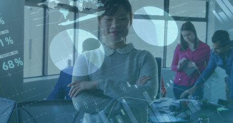 Image of financial data processing over asian businesswoman in office - Powered by Adobe