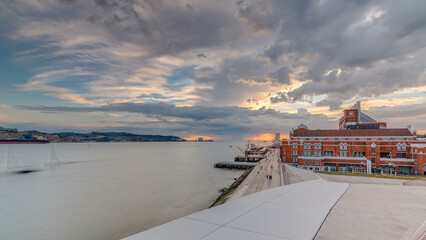 Sunset panorama with the Padrao dos Descobrimentos Monument to the Discoveries timelapse in Lisbon