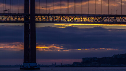 Lisbon city sunrise with April 25 bridge timelapse
