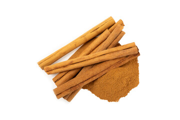 Cinnamon powder isolated on white background. Spicy spice for baking, desserts and drinks. Fragrant ground cinnamon.
